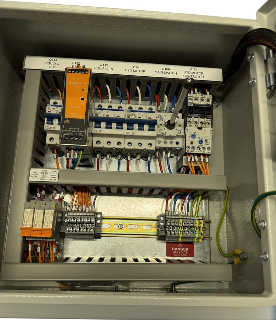 Hydraulic motor control panel with labelled MCBs, power supply and motor contactor
