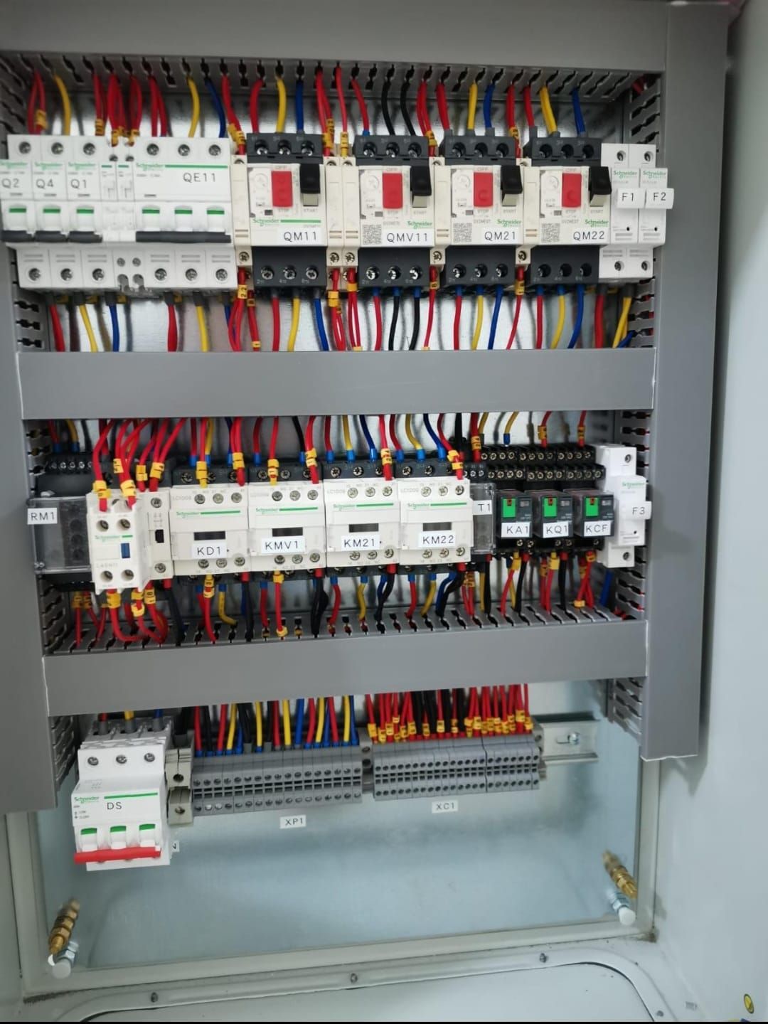 Industrial motor control panel with branded circuit breakers and contactors